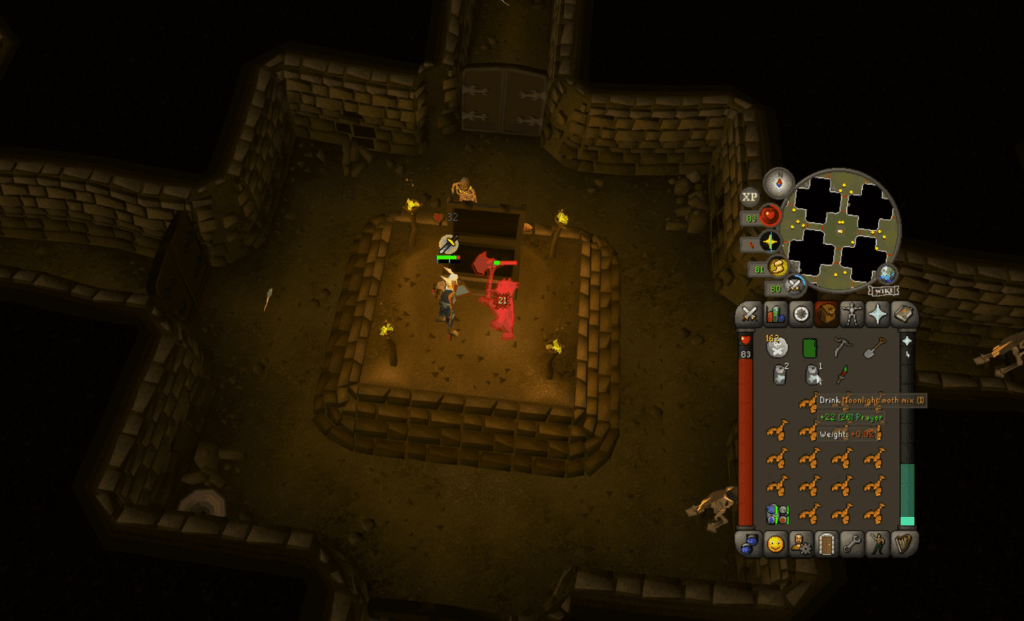 Fighting Dharok at the final room of the Barrows tunnels